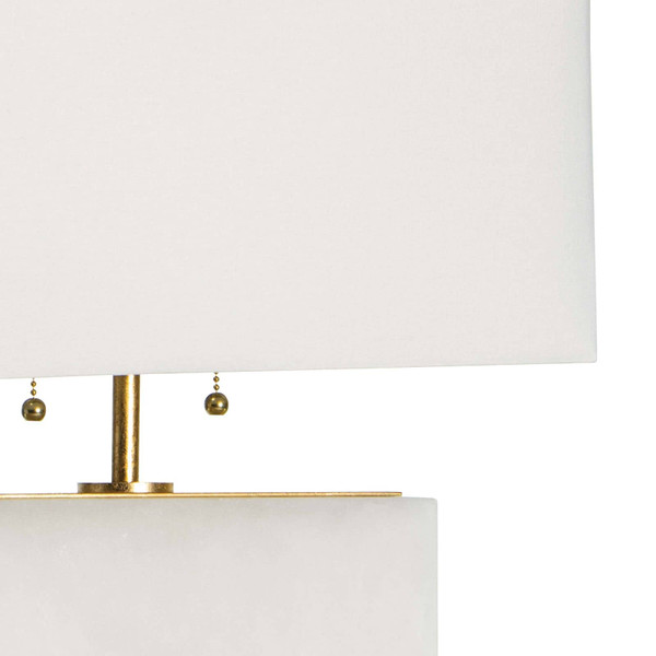 White linen shade of an alabaster table lamp